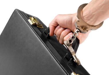 Hand on handcuffs with a briefcase clipart