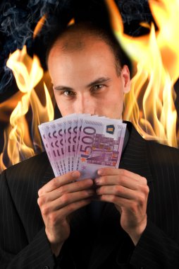 Businessman holding money clipart