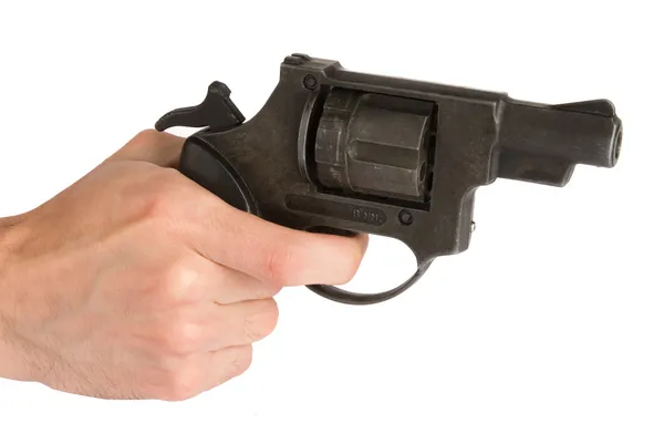 Revolver i en hand — Stockfoto