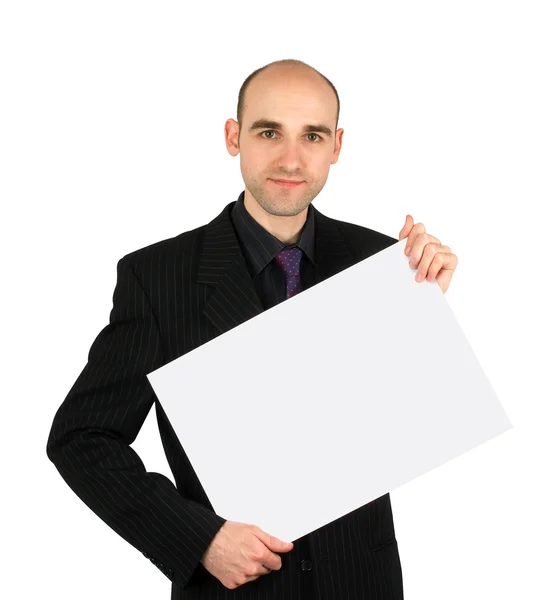 Zakenman houden een witte leeg bord — Stockfoto