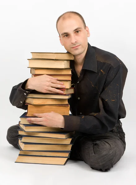 Άνθρωπος με βιβλία. απομονωθεί σε λευκό — Φωτογραφία Αρχείου