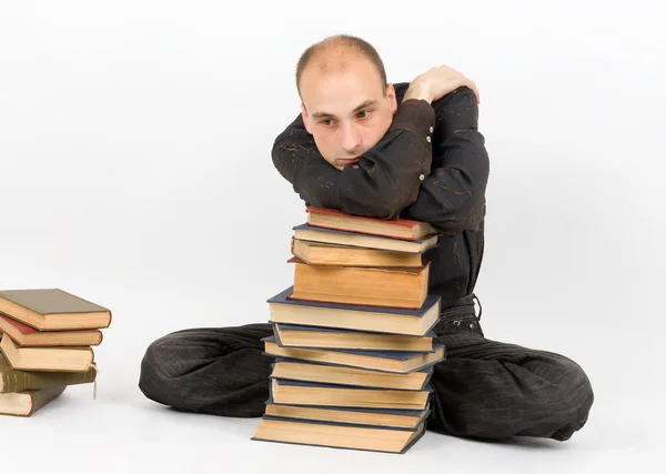 Muž s knihami — Stock fotografie