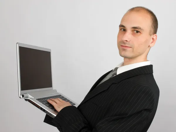 Business man with his laptop — Stock Photo, Image