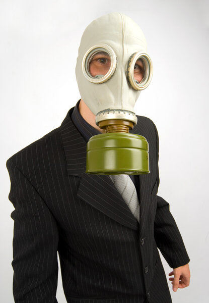 Business man in a gas mask