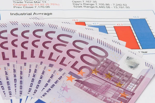Closeup of a chart with a money — Stock Photo, Image