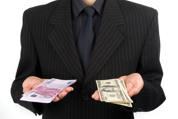 Man in pak aanhouden van geld — Stockfoto