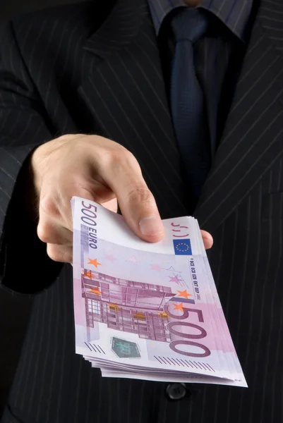 Pengusaha memegang euro. — Stok Foto