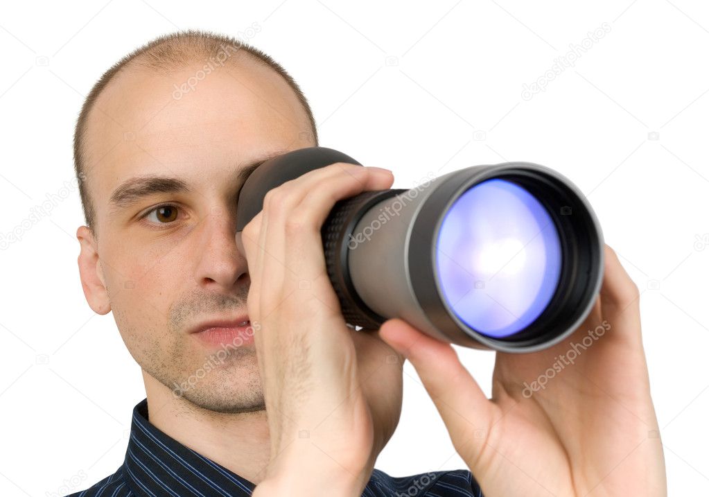 Man looking through spyglass