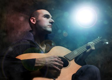 Man playing acoustic guitar clipart