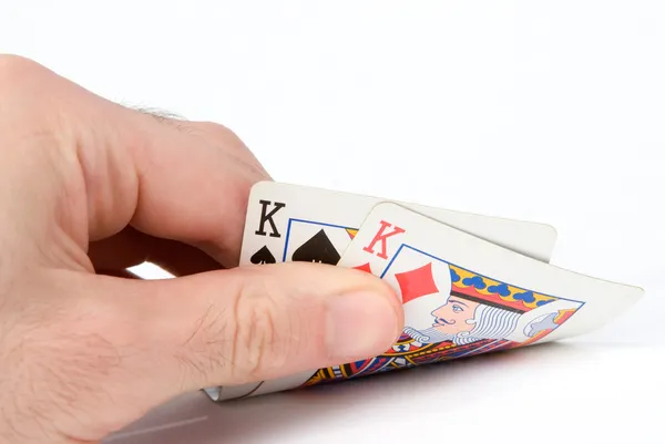 Två korten i en hand — Stockfoto
