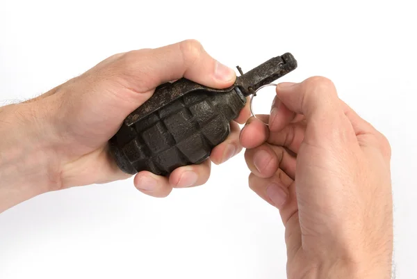 Mãos masculinas segurando uma granada de mão — Fotografia de Stock