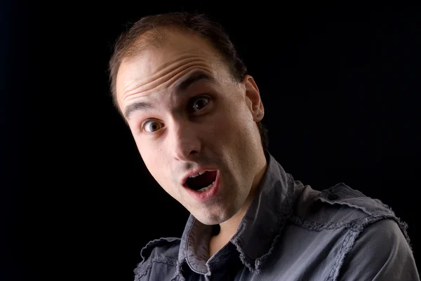 Surprised expression on a man face — Stock Photo, Image