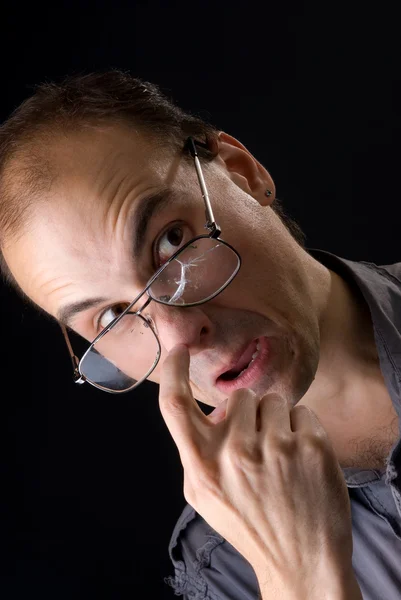 Thinking man in a broken glasses — Stock Photo, Image