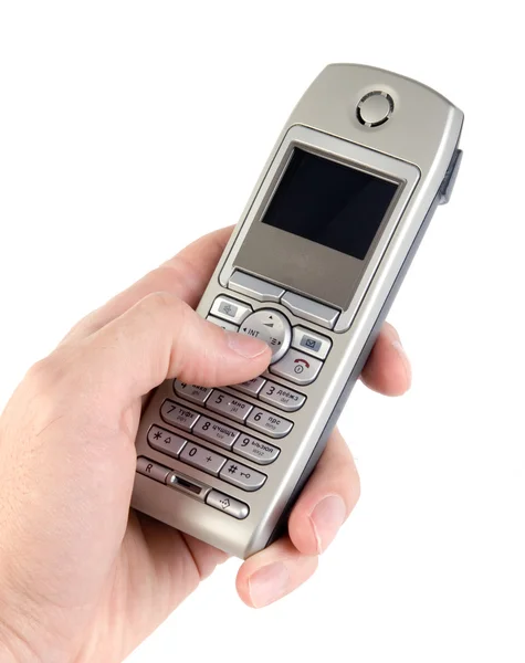 Draadloze telefoon in de hand — Stockfoto