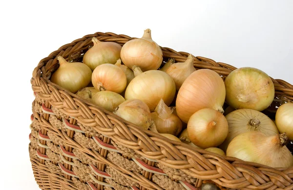 Onion fruits in the basket — Stock Photo, Image