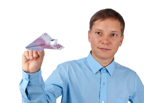 Businessman throwing an airplane — Stock Photo, Image