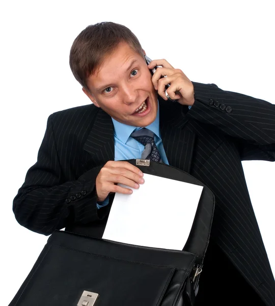 Obchodní muž mluví do mobilního telefonu — Stock fotografie