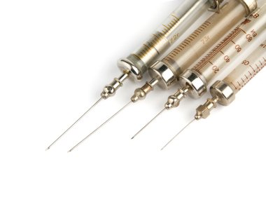 Old injecting glass syringes clipart