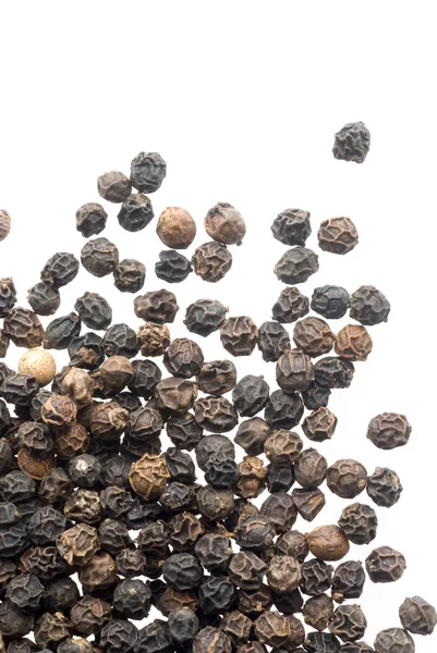 Primer plano de granos de pimienta negra —  Fotos de Stock
