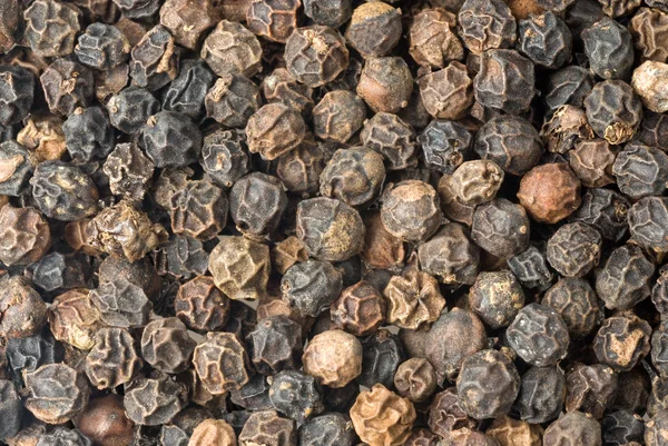 Background of black peppercorns — 스톡 사진
