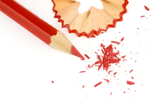 Red pencil with pencil shavings — Stock Photo, Image