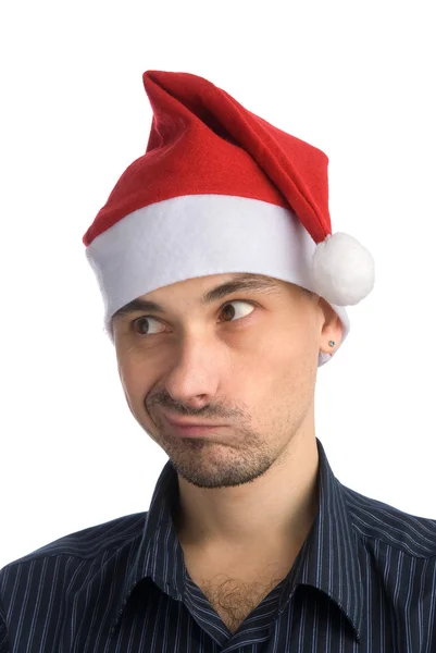 Mladý muž v čepici santa — Stock fotografie