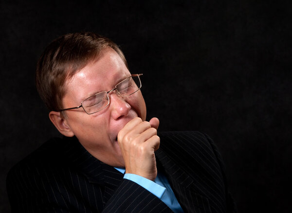 Yawning businessman