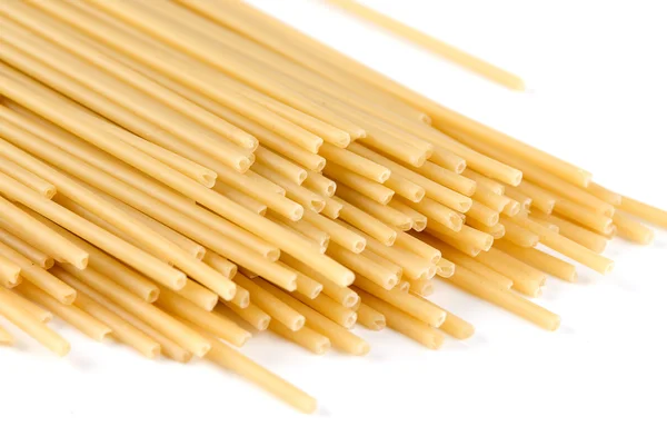 Неприготовленные итальянские спагетти крупным планом — стоковое фото