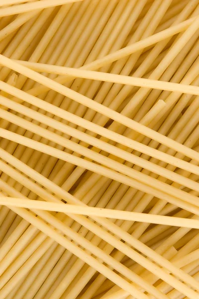 Неприготовленные итальянские спагетти — стоковое фото