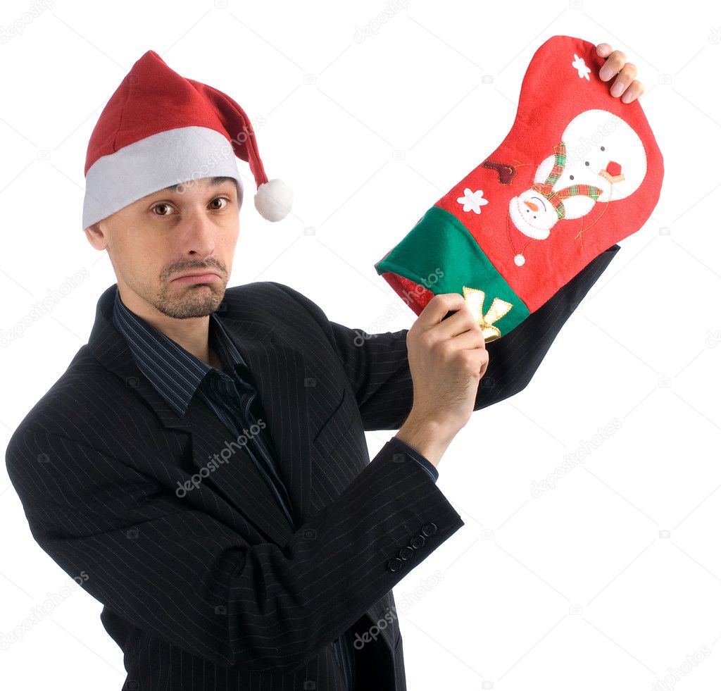 Upset businessman in a Christmas hat