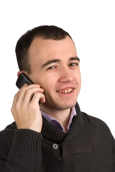 Χαρούμενος νεαρός άνδρας που μιλάει στο τηλέφωνο — Φωτογραφία Αρχείου