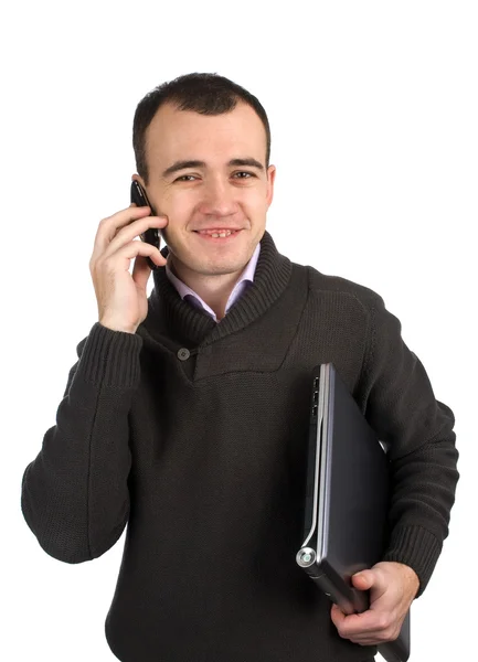 Молодой человек звонит по мобильному телефону — стоковое фото