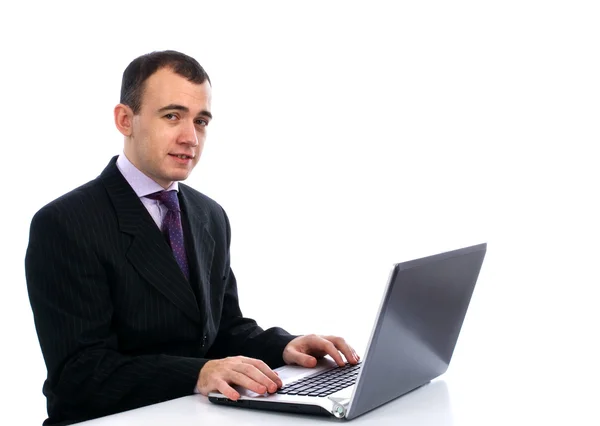Uomo d'affari che lavora sul suo portatile — Foto Stock