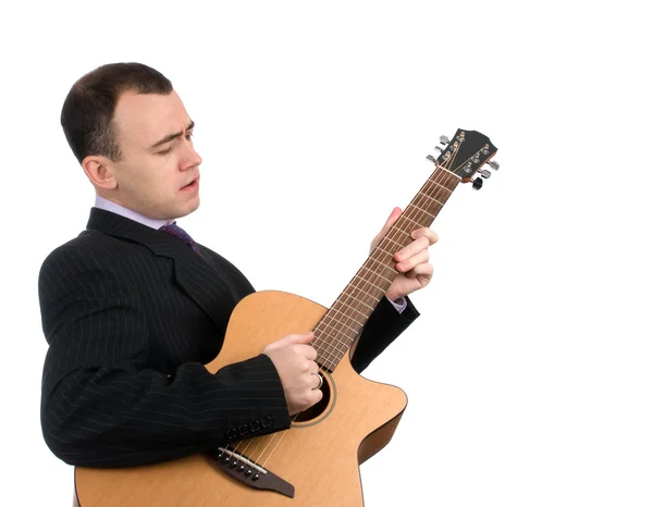 Businessman playing a guitar — Stock Photo, Image