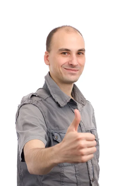 Young man showing thumbs up sign — Stock Photo, Image