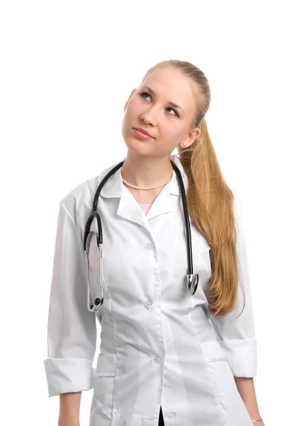 Jonge aantrekkelijke vrouwelijke arts denken — Stockfoto