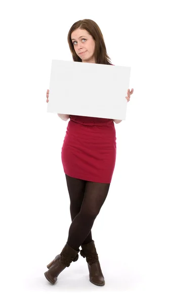 Young woman holding an empty billboard — Stock Photo, Image