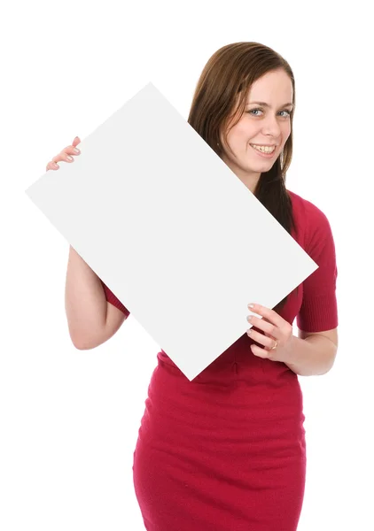Młoda kobieta trzymając pusty billboard — Zdjęcie stockowe