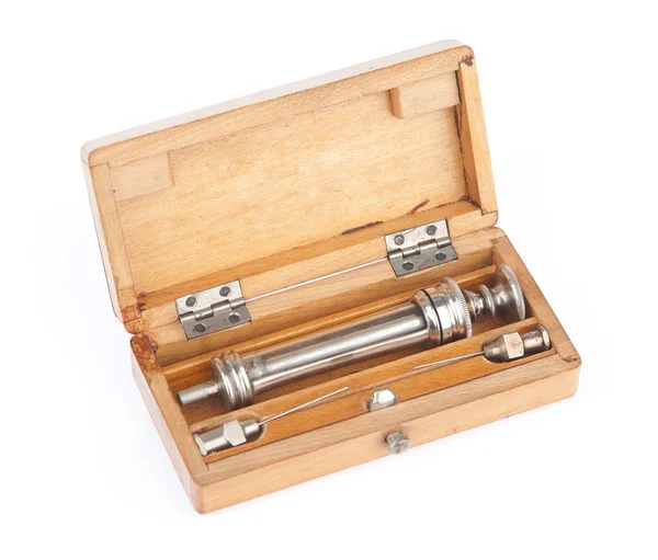 Old syringe in a case — Stock Photo, Image