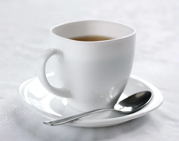 stock image White cup of tea.