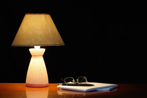 Lamp And Spiral Notebook — Stock Photo, Image