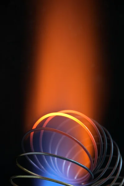 炎で金属スパイラル — ストック写真