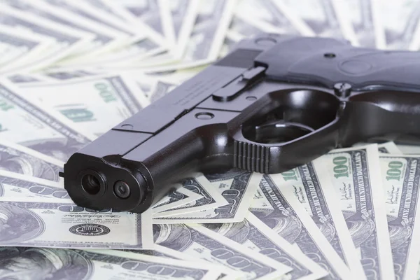 Broń i pieniądze — Zdjęcie stockowe