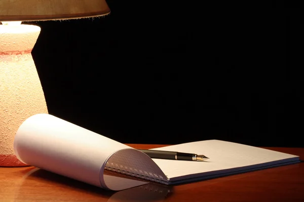 Lamp And Spiral Notebook — Stock Photo, Image