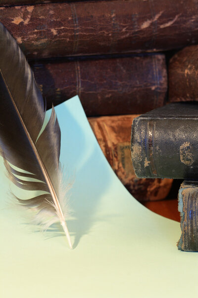 Books And Feather