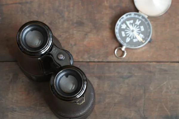 Binoculars And Compass