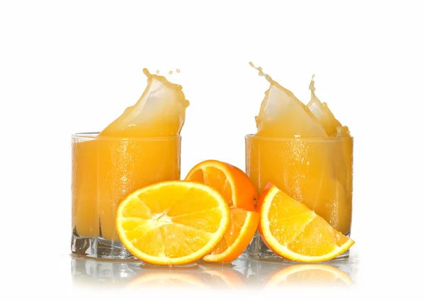 Zumo de naranja salpicante —  Fotos de Stock