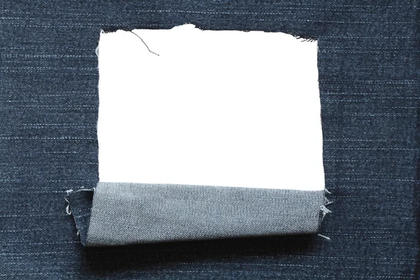 Otwór w dżinsy teksturowanej — Zdjęcie stockowe