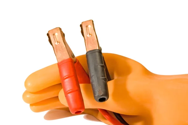 Rubber glove holds plugs — Stock Photo, Image