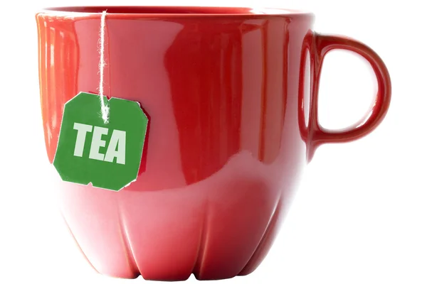 Kleine rote Teetasse mit Teebeutel (Ausschnitt) — Stockfoto